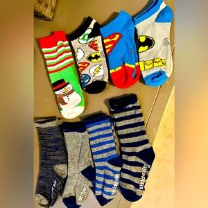 8 pairs Boys Socks. Like new. 4 Dress sets, 3 Superhero, 1 snowman. Sz Small